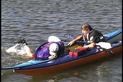 stabilze second kayak so 2nd paddler can get back in their cockpit