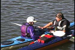 everyone is back in their kayak with water out of cockpit