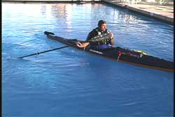 paddler up with paddle just past ninety degrees