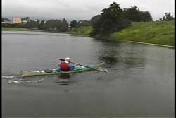 Derek edging his kayak and beginning sweep