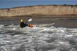 paddler upright moving toward shore