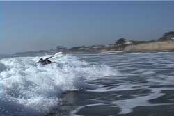 kayaker upright after wave broke over them